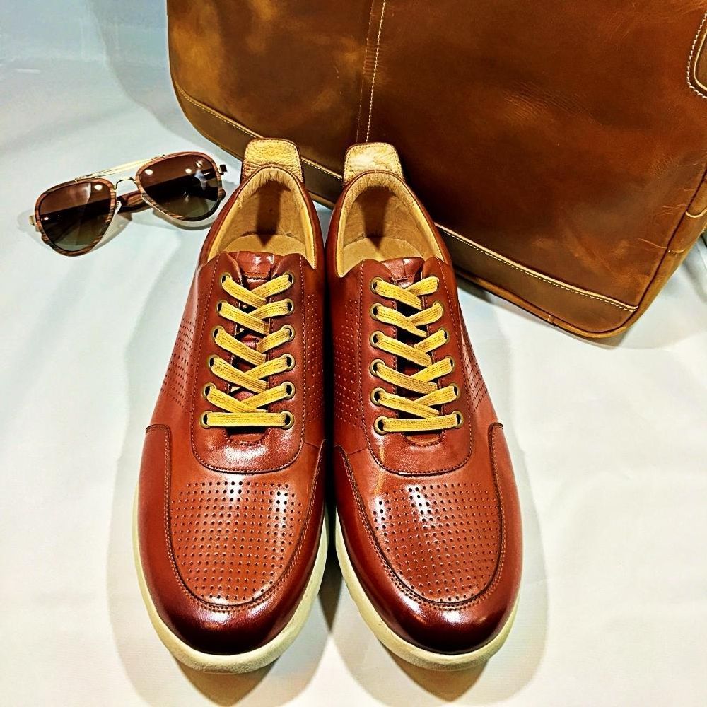 leather shoe with  tan rubber sole - sunglasses