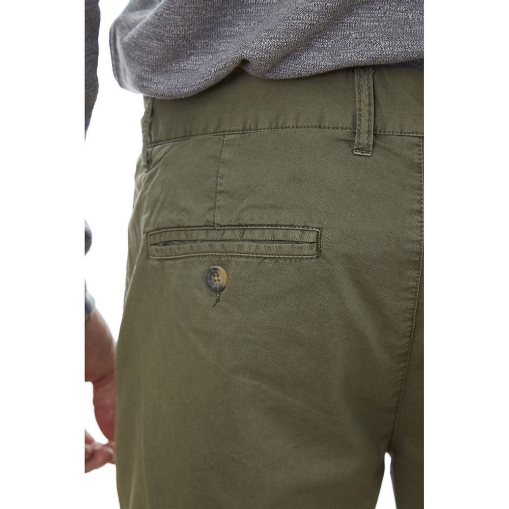 man in Adan Men's Twill Shorts - olive - back view